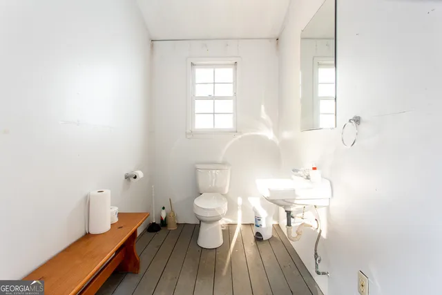 a bathroom with a sink and a toilet