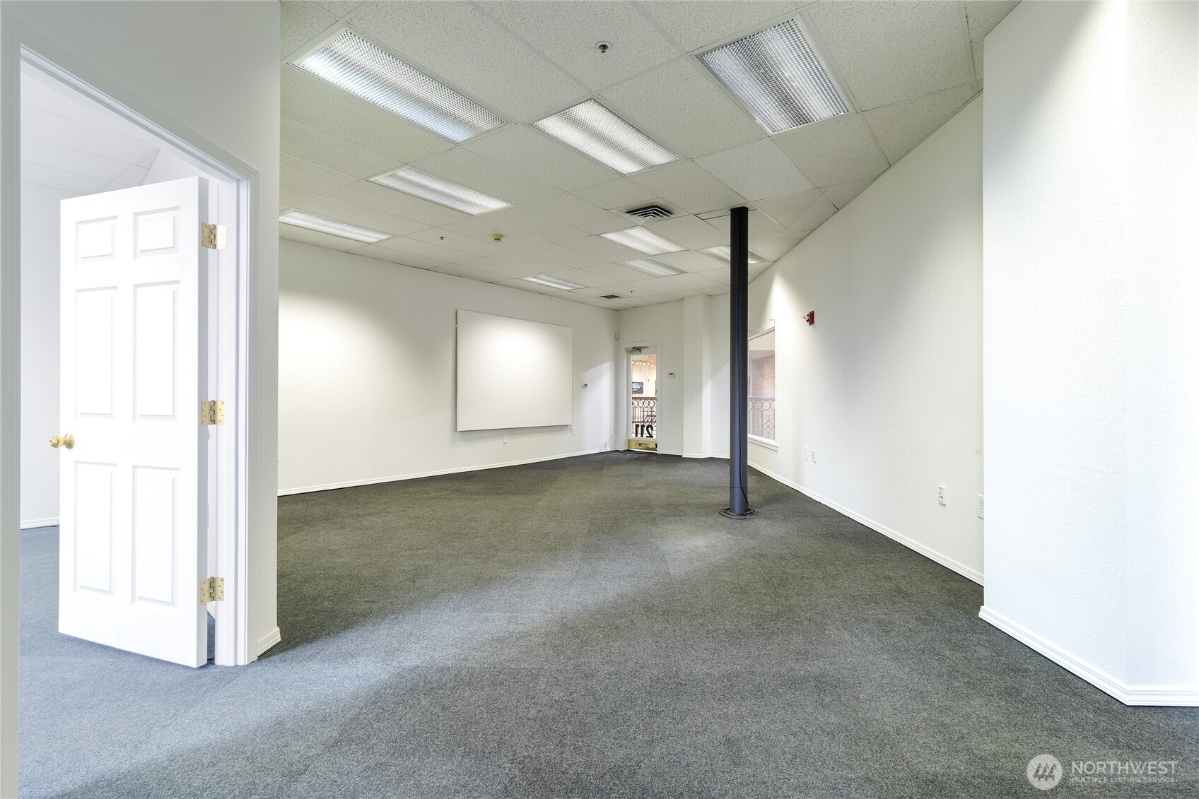 38 East Main Street Walla Walla, WA 99362 - Photo 15 of 24 an empty room with windows and entrance