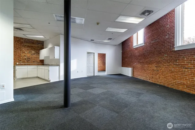 a kitchen with a stove and a cabinets