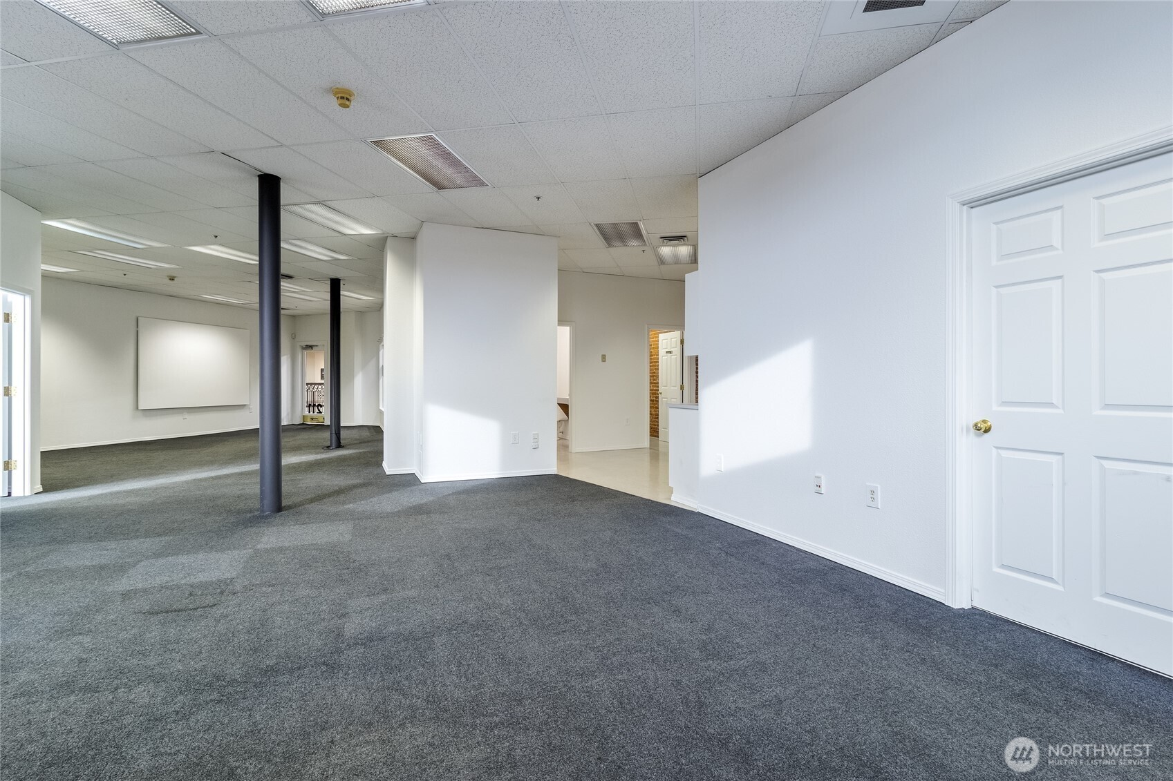 38 East Main Street Walla Walla, WA 99362 - Photo 17 of 24 en empty room with windows and entrance