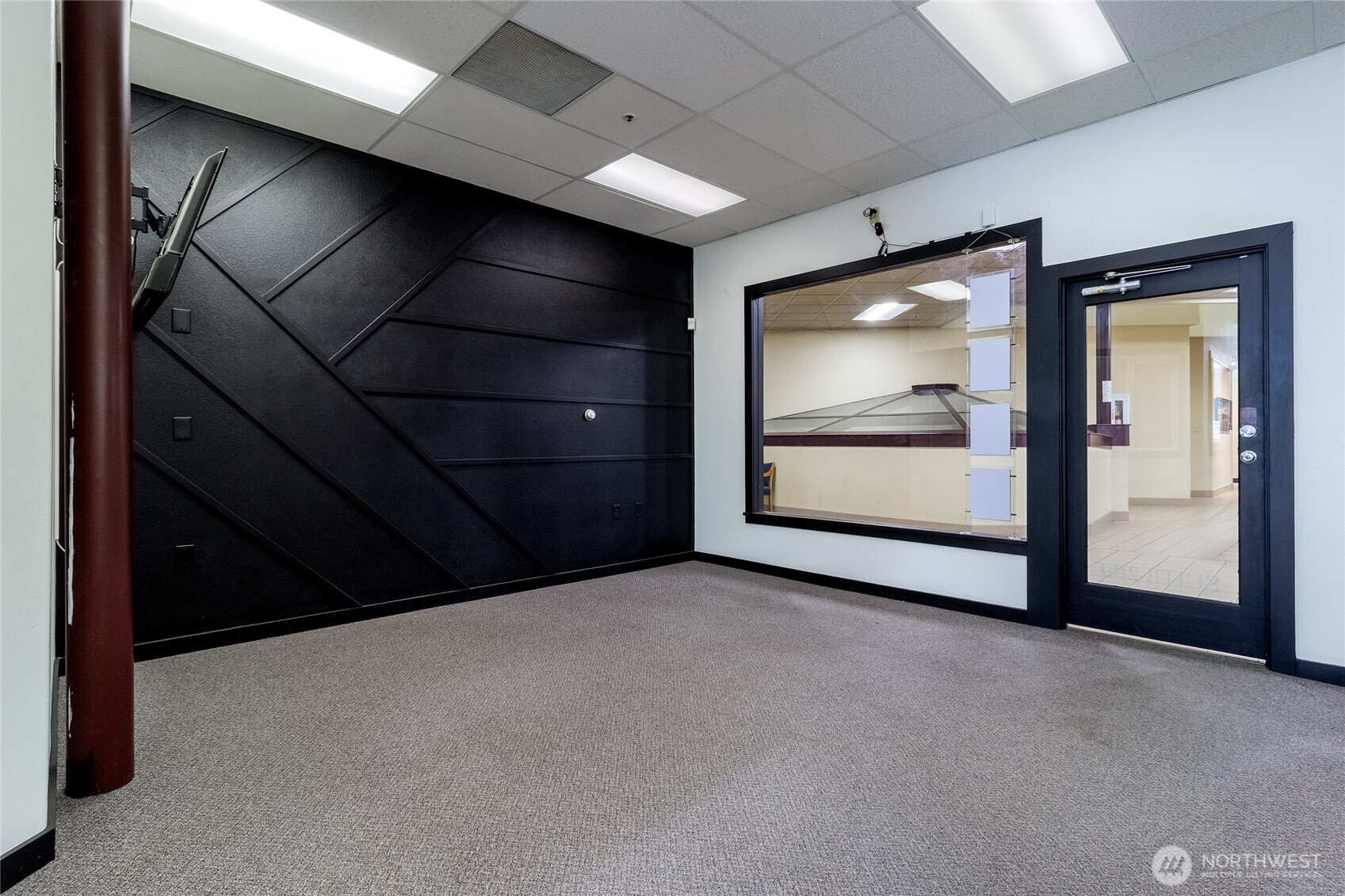 38 East Main Street Walla Walla, WA 99362 - Photo 5 of 24 a view of an empty room with a window