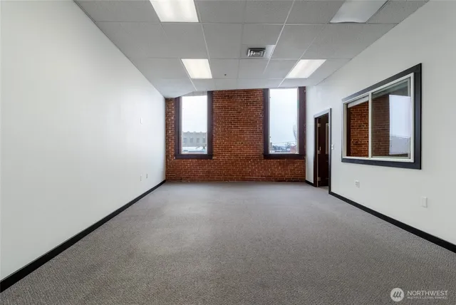 an empty room with windows