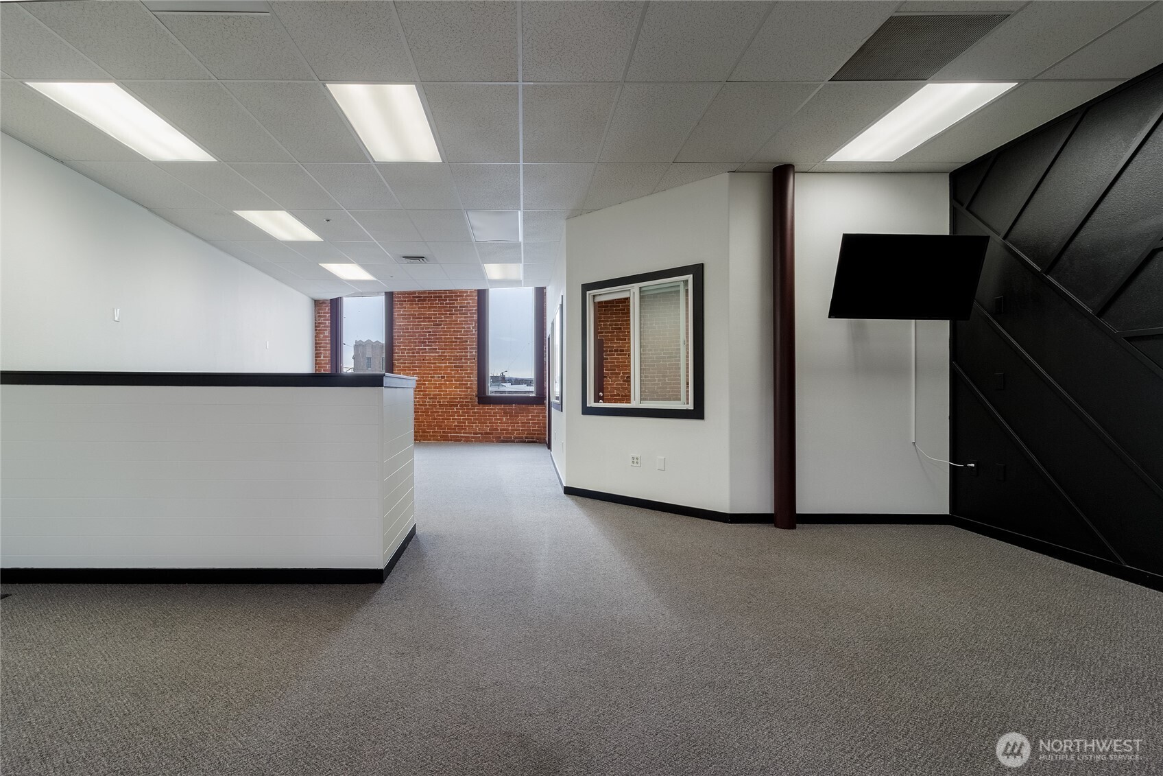38 East Main Street Walla Walla, WA 99362 - Photo 8 of 24 a view of a kitchen with furniture and a refrigerator