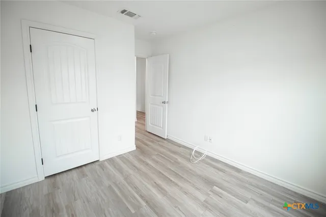 a view of small space with racks on the wall