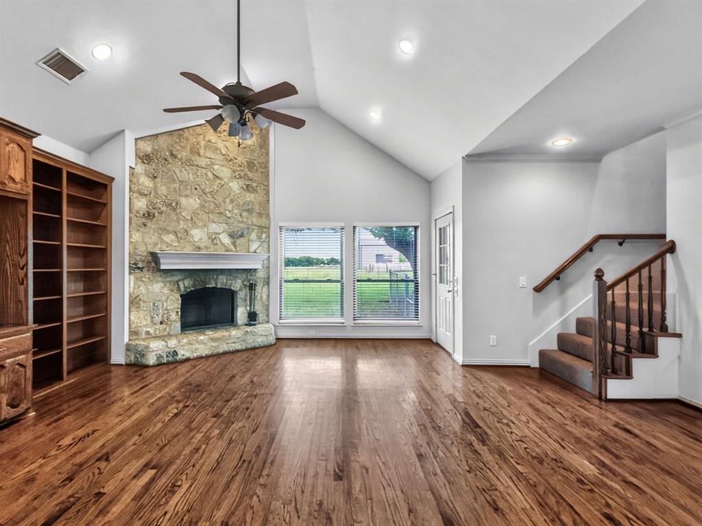 1255 Vineyard Road Gunter, TX 75058 - Photo 4 of 20 Fireplace in living room with tall ceilings