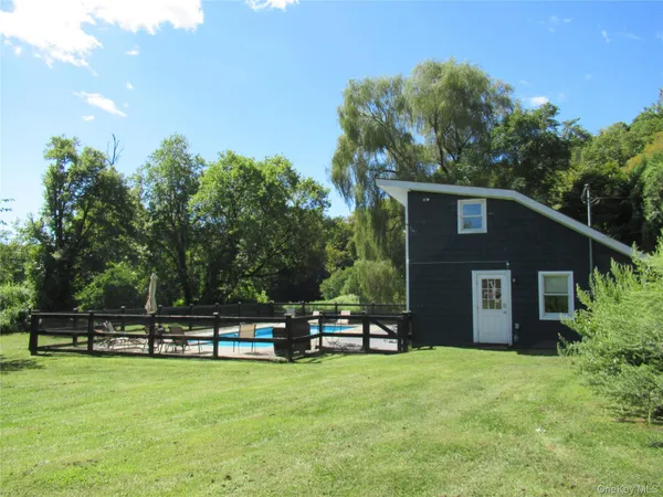 a house view with a garden space