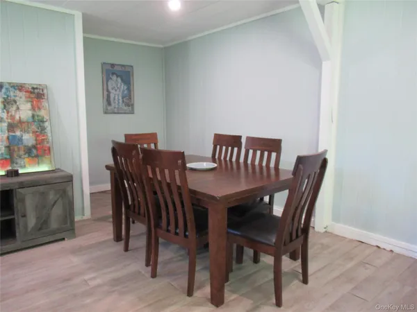 a view of a dining room with furniture
