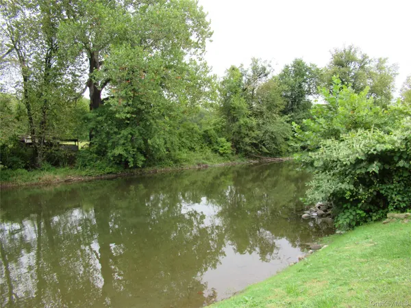 a view of a lake view with a garden