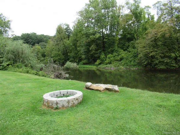a view of a lake with a park