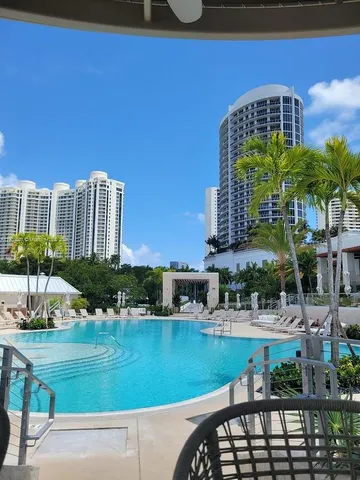 a front view of a building with garden