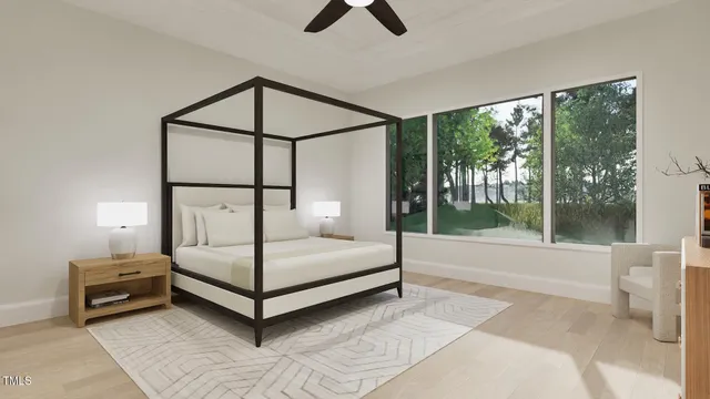 a bedroom with a bed and a painting on the wall