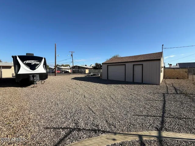 a house view with a backyard space