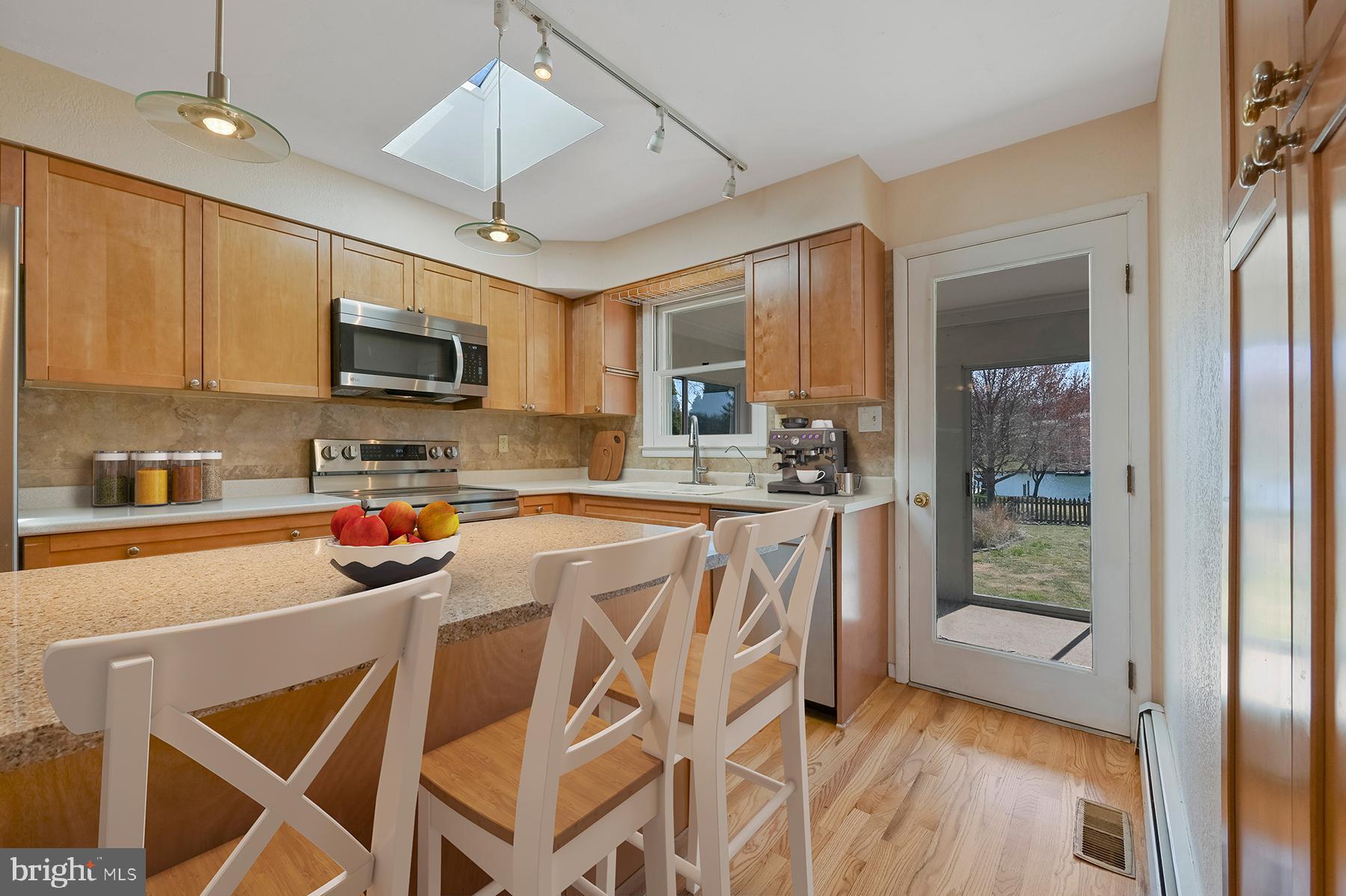1921 Orchard Point Road Pasadena, MD 21122 - Photo 12 of 48 Breakfast bar in the kitchen for casual dining