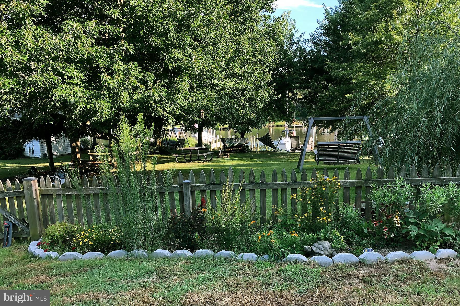 1921 Orchard Point Road Pasadena, MD 21122 - Photo 3 of 48 View to the pier over the summer
