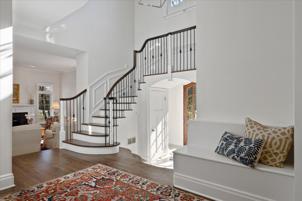 755 Sheridan Road Glencoe, IL 60022 - Photo 13 of 36 a living room with wooden floor and a rug