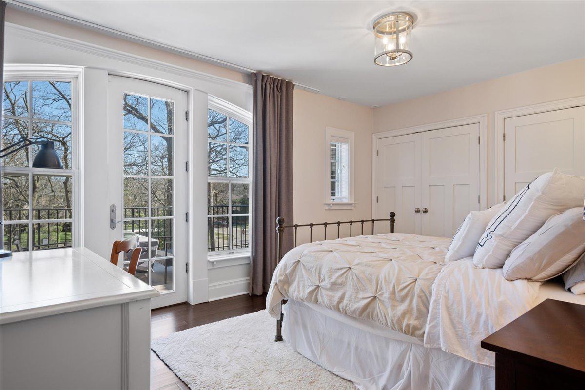 755 Sheridan Road Glencoe, IL 60022 - Photo 31 of 36 a bedroom with a bed and a large window