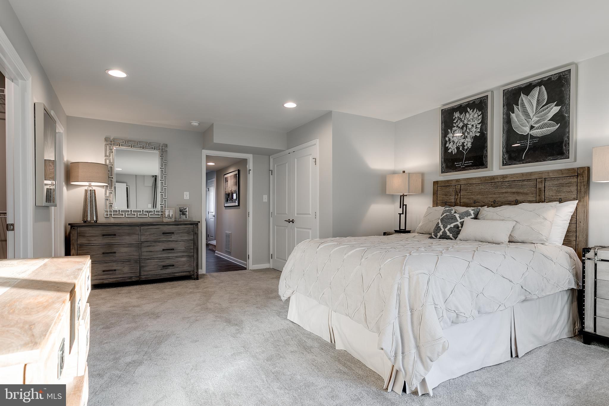 5602 Greenpoint Lane, Unit E Upper Marlboro, MD 20772 - Photo 15 of 24 Primary Bedroom