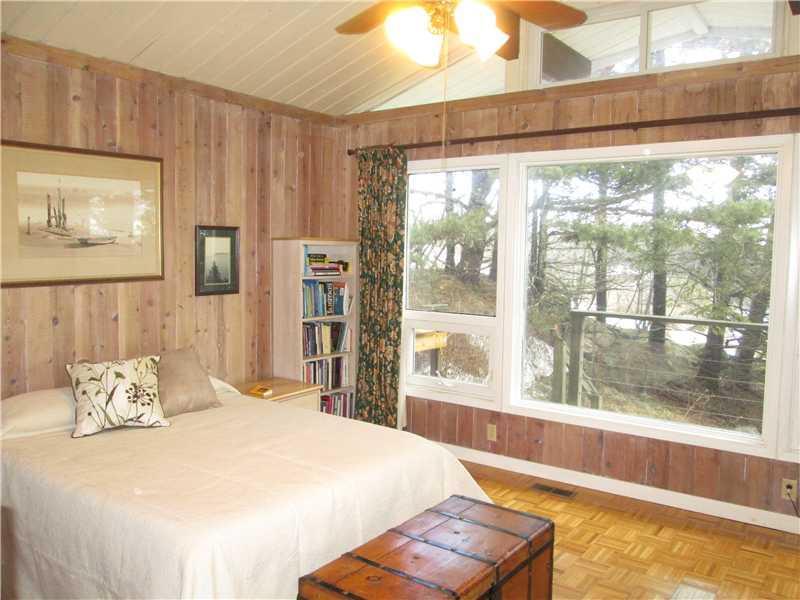 104 Seguinland Road Georgetown, ME 04548 - Photo 9 of 13 Bedroom. Master bedroom with wood...