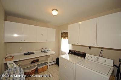 357 Oak Hill Road Middletown, NJ 07701 - Photo 12 of 24 a room with storage and utility