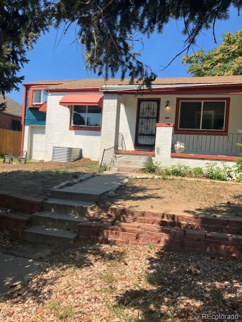 4775 Decatur Street Denver, CO 80211 - Photo 2 of 13 a backyard of a house