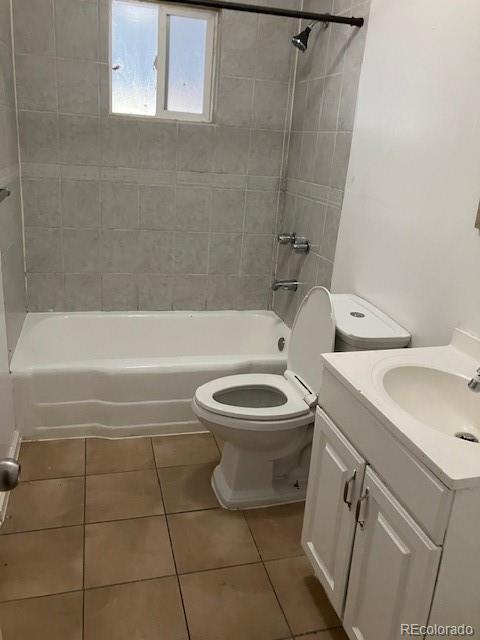 4775 Decatur Street Denver, CO 80211 - Photo 5 of 13 a bathroom with a toilet sink and bathtub