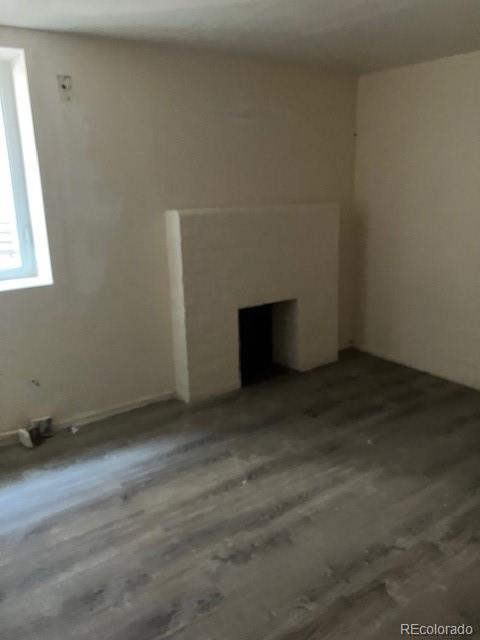 4775 Decatur Street Denver, CO 80211 - Photo 8 of 13 an empty room with a empty space