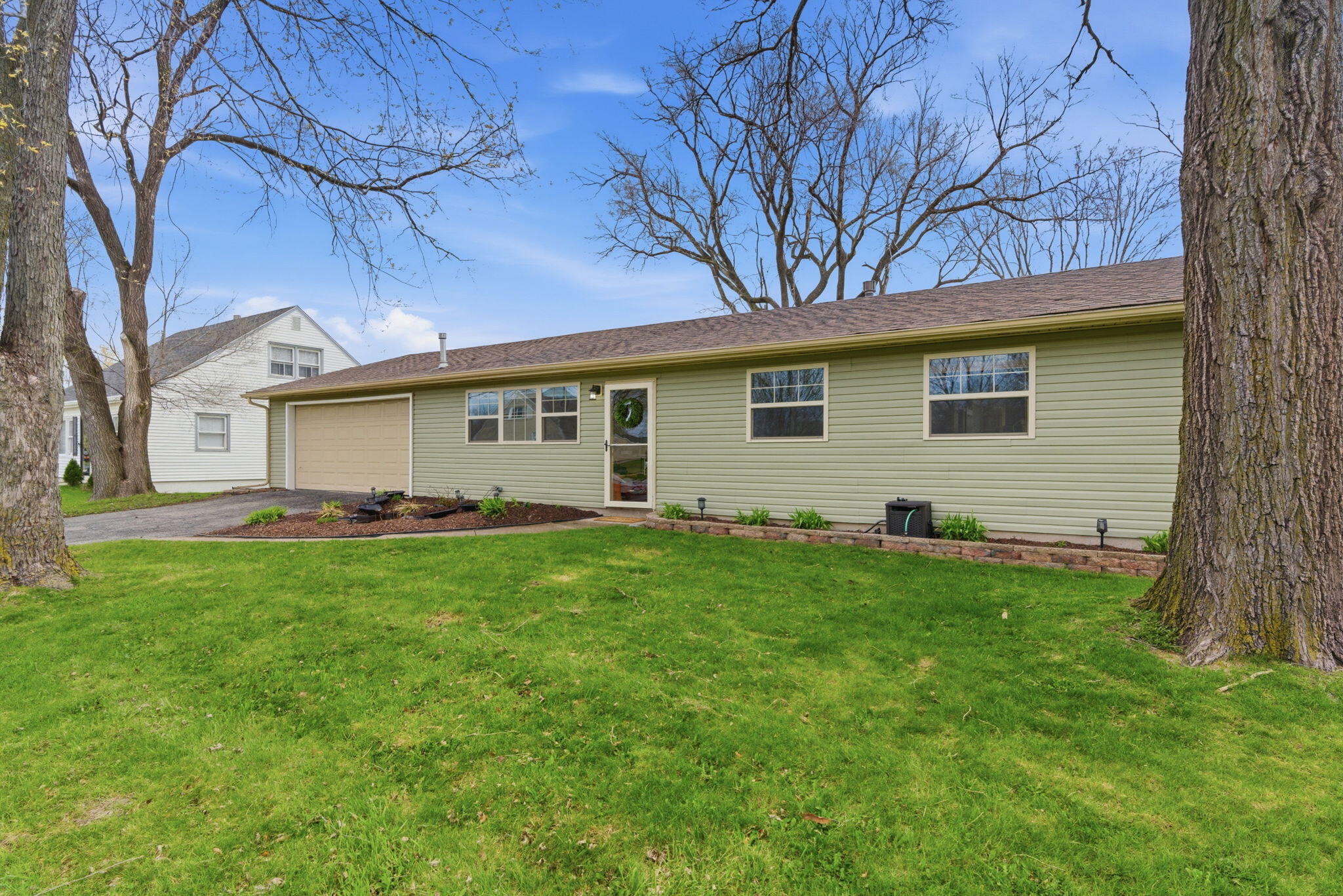 621 Old Forge Road Valparaiso, IN 46385 - Photo 1 of 15 a view of a backyard with a garden