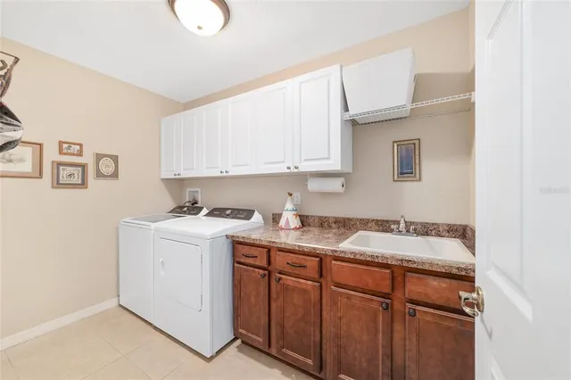 a room with a sink and a cabinets