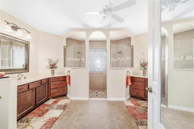 a view of room with cabinets and wooden floor