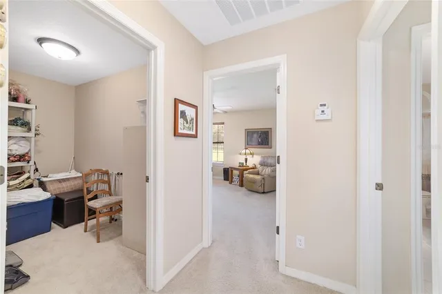 a view of a livingroom with furniture and a livingroom with furniture