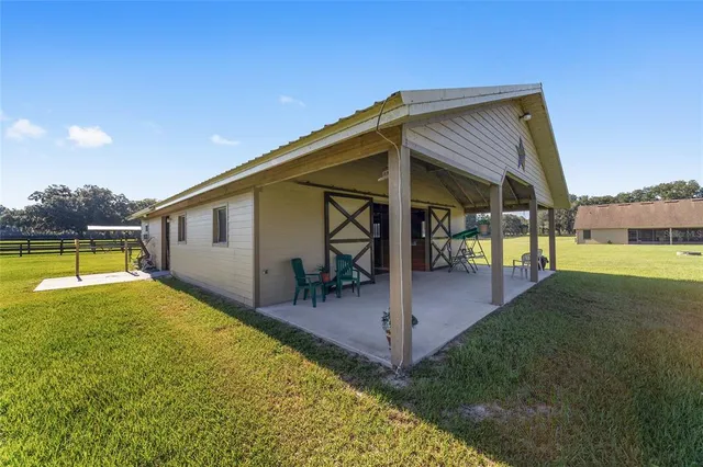 a view of a house with a swimming pool