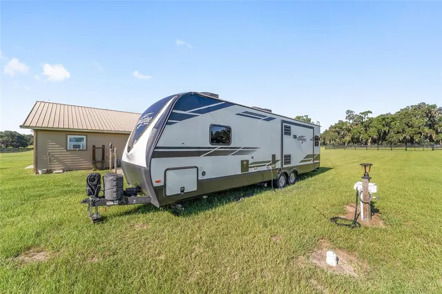 a house view with a garden space