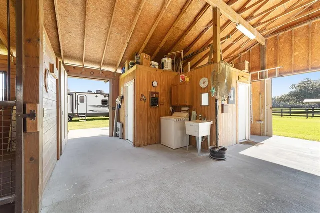 a view of a bathroom with a tub and a shower