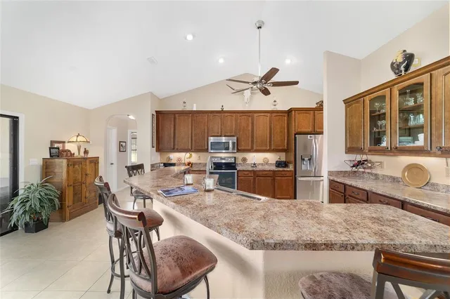 a kitchen with granite countertop lots of counter top space
