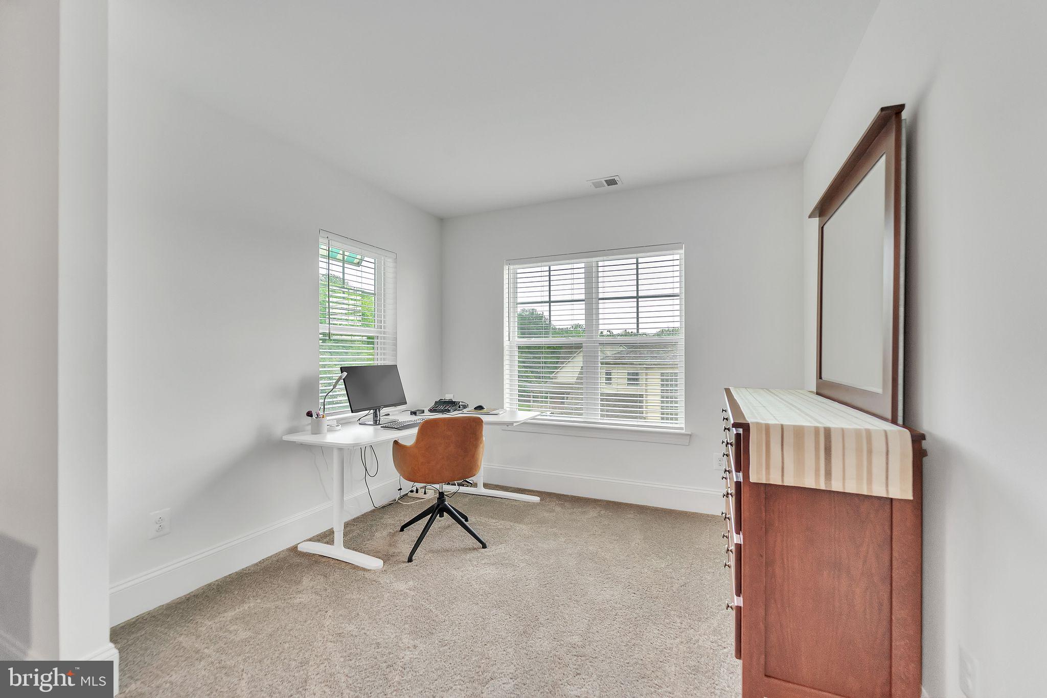 1414 Burke Road, Unit 201 Middle River, MD 21220 - Photo 27 of 35 a living room with furniture and a window