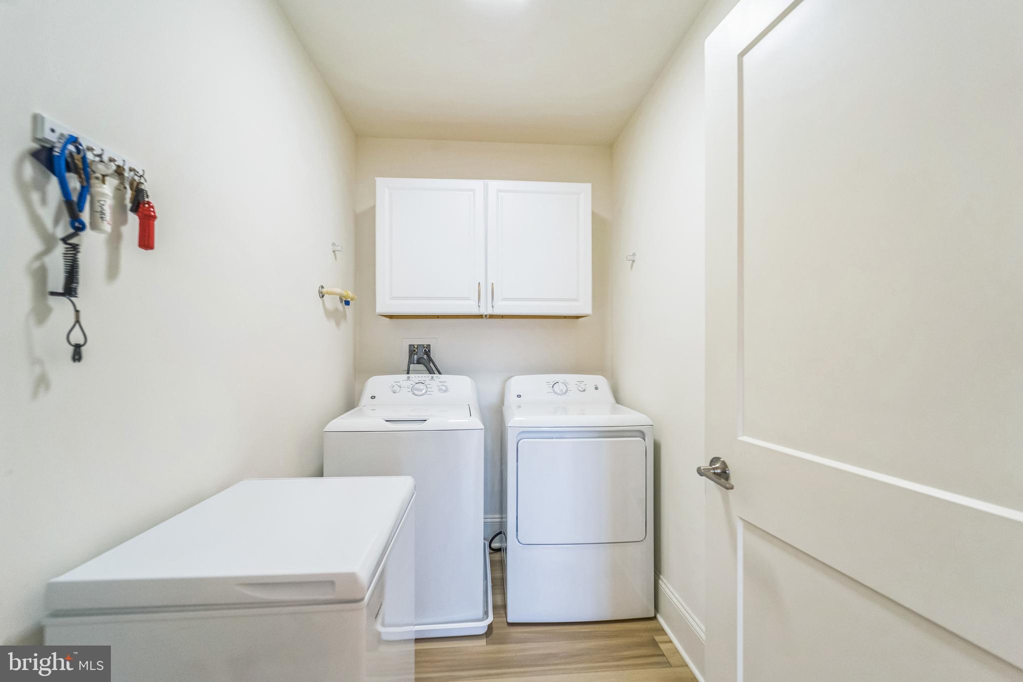 1414 Burke Road, Unit 201 Middle River, MD 21220 - Photo 34 of 35 a utility room with dryer and washer