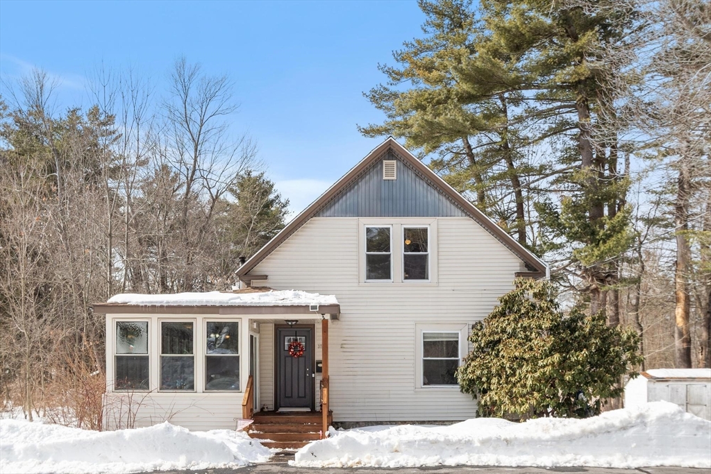 37 Draper Road Gardner, MA 01440 - Photo 1 of 33 a front view of a house with a tree