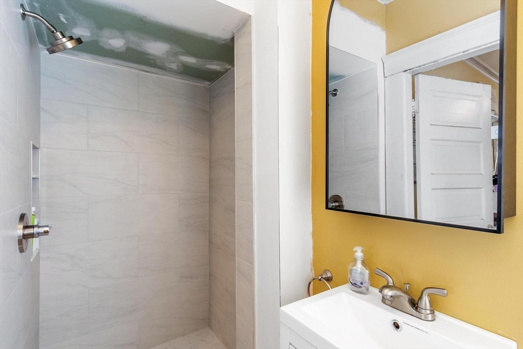 37 Draper Road Gardner, MA 01440 - Photo 16 of 33 a bathroom with a sink and a mirror