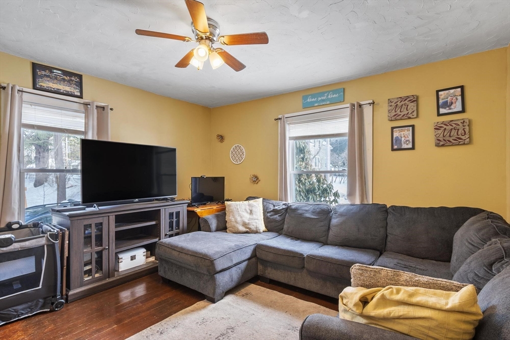 37 Draper Road Gardner, MA 01440 - Photo 18 of 33 a living room with furniture and a flat screen tv