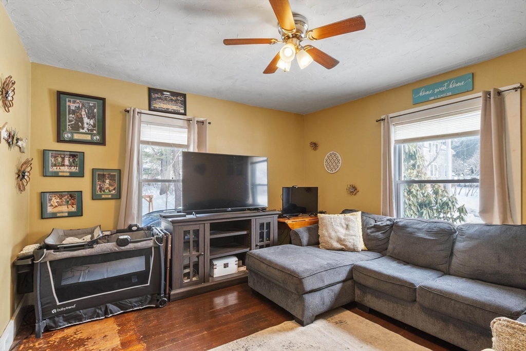 37 Draper Road Gardner, MA 01440 - Photo 19 of 33 a living room with furniture and a flat screen tv