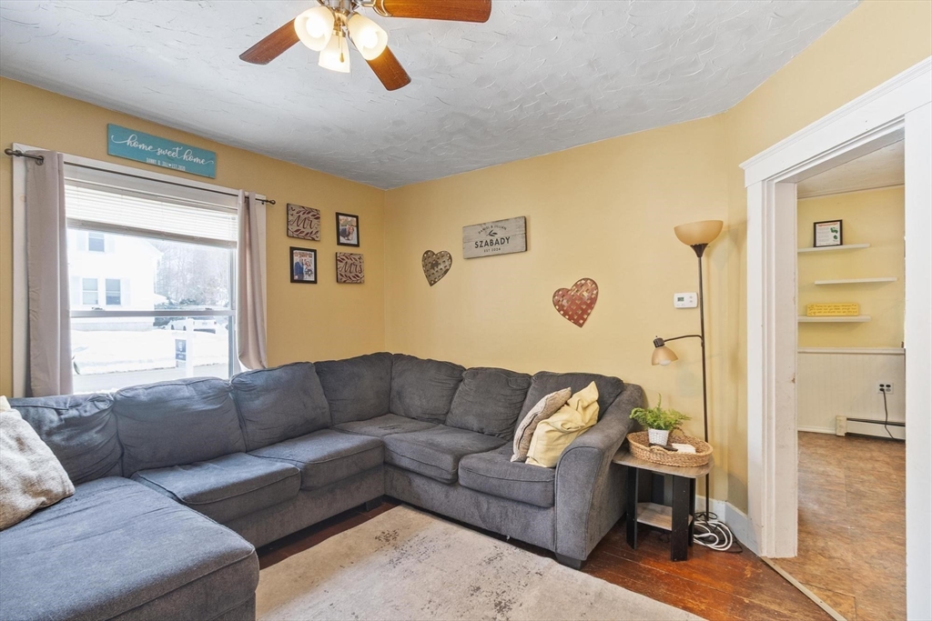 37 Draper Road Gardner, MA 01440 - Photo 20 of 33 a living room with a couch and a window