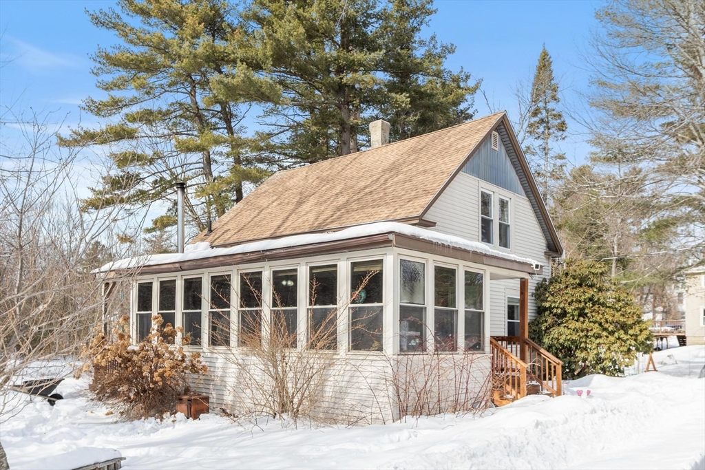 37 Draper Road Gardner, MA 01440 - Photo 2 of 33 a front view of a house with a large tree