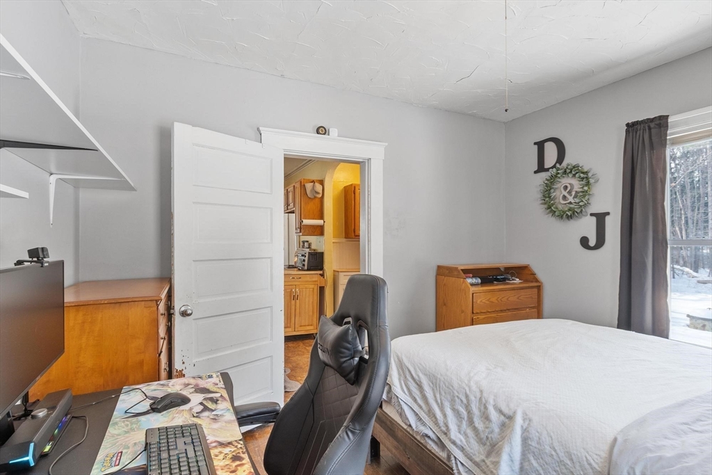 37 Draper Road Gardner, MA 01440 - Photo 22 of 33 a bedroom with a bed and a window