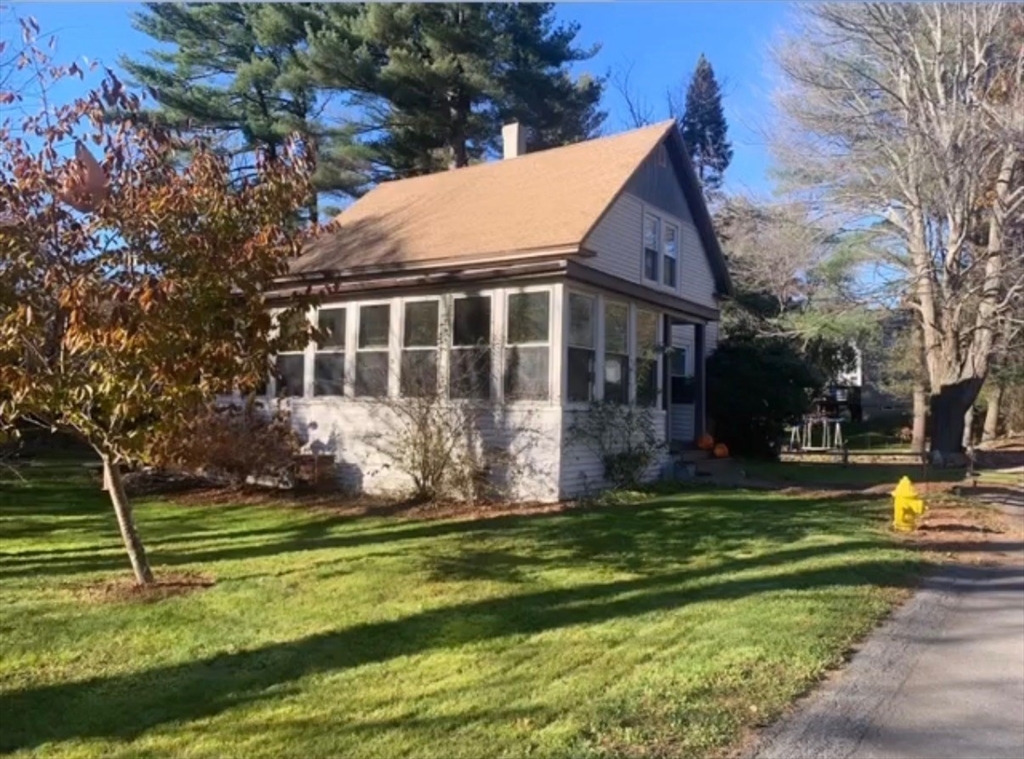 37 Draper Road Gardner, MA 01440 - Photo 30 of 33 a front view of a house with a garden