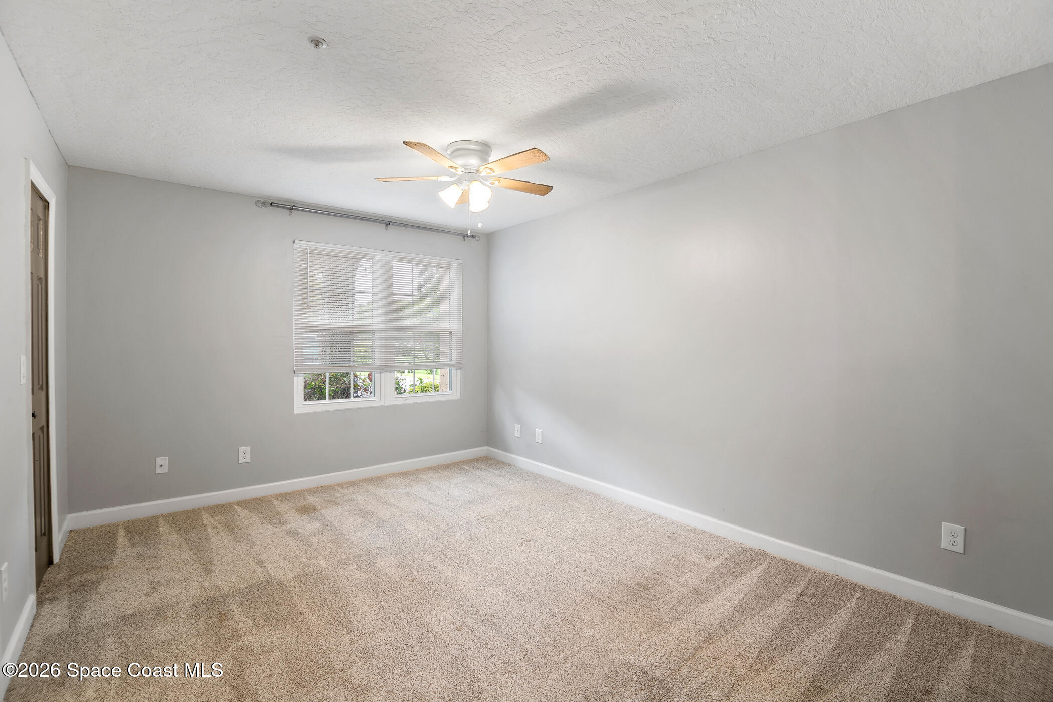 7667 North Wickham Road, Unit 1201 Melbourne, FL 32940 - Photo 10 of 29 Primary Bedroom