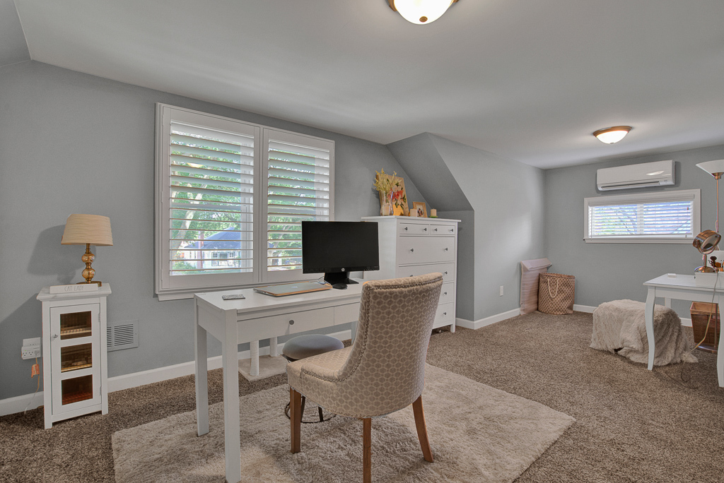 780 Spring Road Elmhurst, IL 60126 - Photo 31 of 42 a view of a livingroom with furniture and a flat screen tv