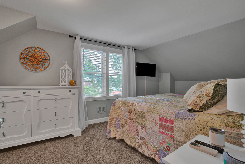 780 Spring Road Elmhurst, IL 60126 - Photo 34 of 42 a bedroom with a bed and a window