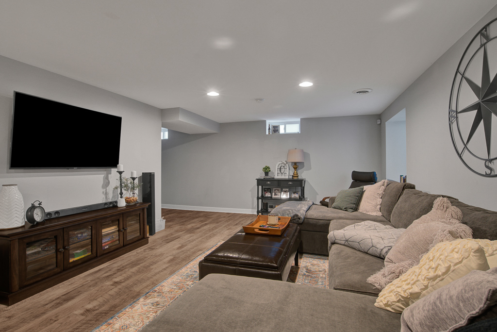 780 Spring Road Elmhurst, IL 60126 - Photo 40 of 42 a living room with furniture and a flat screen tv