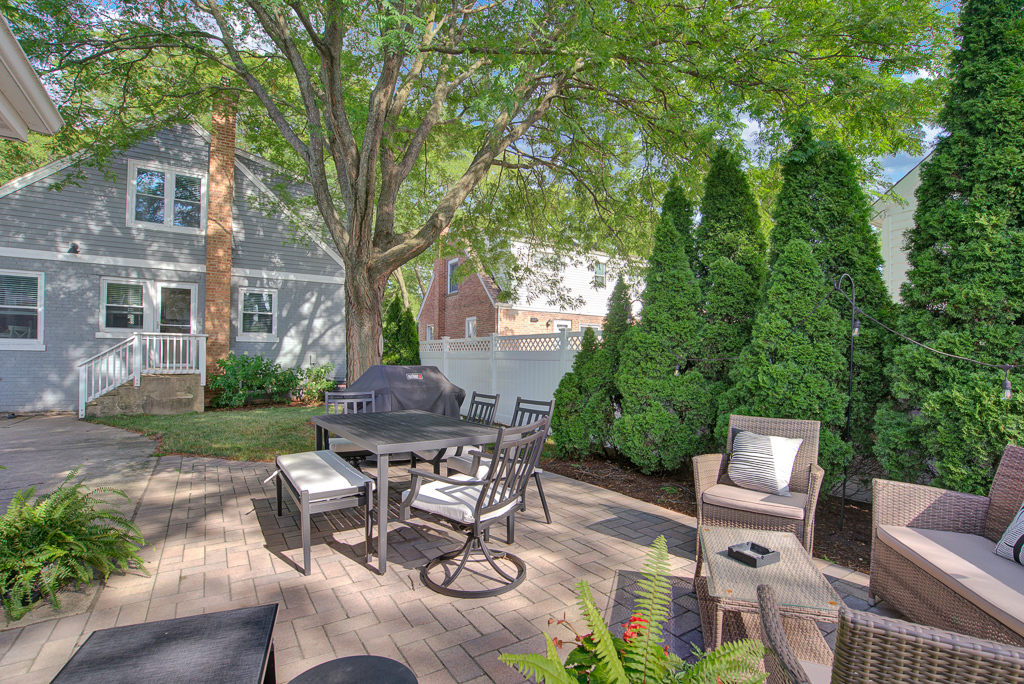 780 Spring Road Elmhurst, IL 60126 - Photo 9 of 42 a view of a patio with couches table and chairs and potted plants