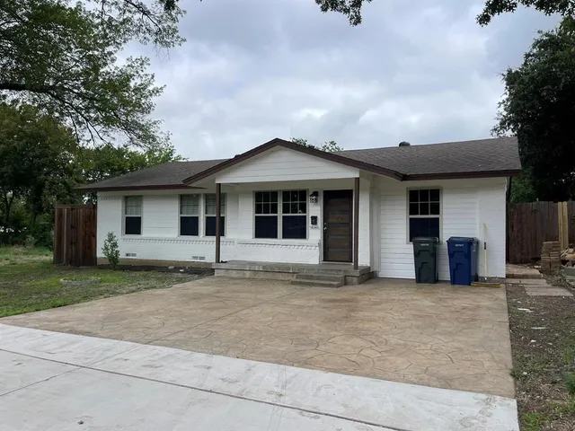 front view of a house with yard